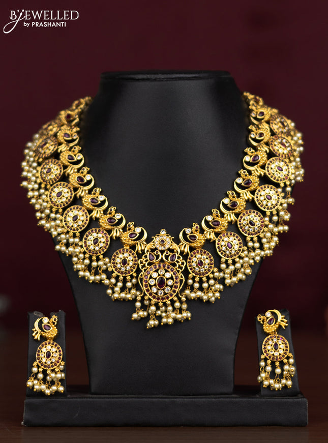 Antique guttapusalu necklace peacock design with pink kemp & cz stones and pearl hangings