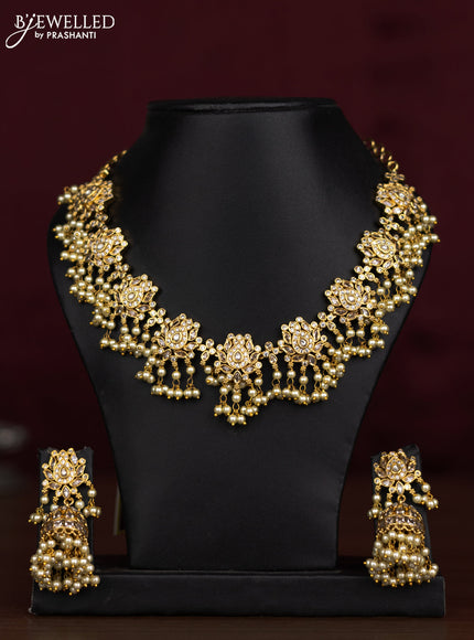 Antique guttapusalu necklace floral design with cz stones and pearl hangings