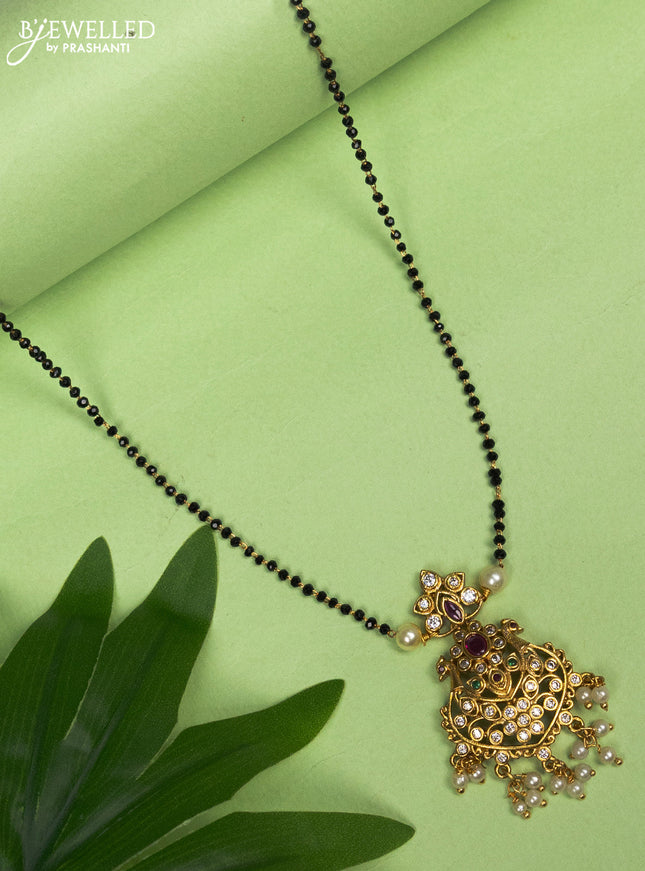 Mangalsutra peacock design pendant with kemp & cz stones and pearl hangings without earring