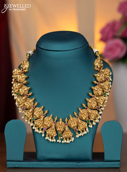 Antique necklace lakshmi design with kemp stones and pearl hangings without earring