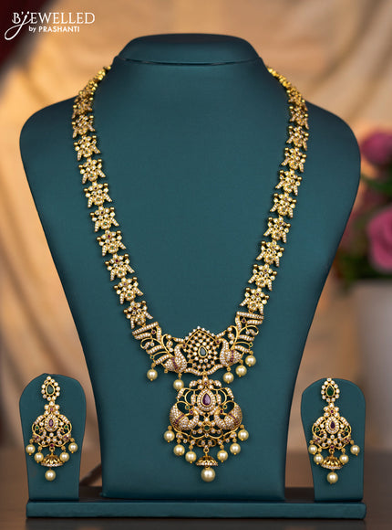 Antique haaram pecock design with kemp and cz stones and pearl hangings