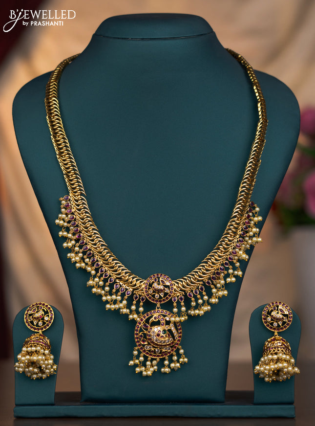 Antique haaram pecock design with kemp and cz stones and pearl hangings
