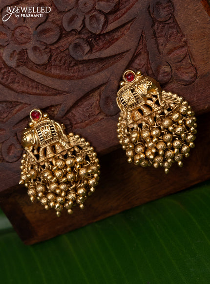 Antique earring elephant design with pink kemp stone and golden beads hanging