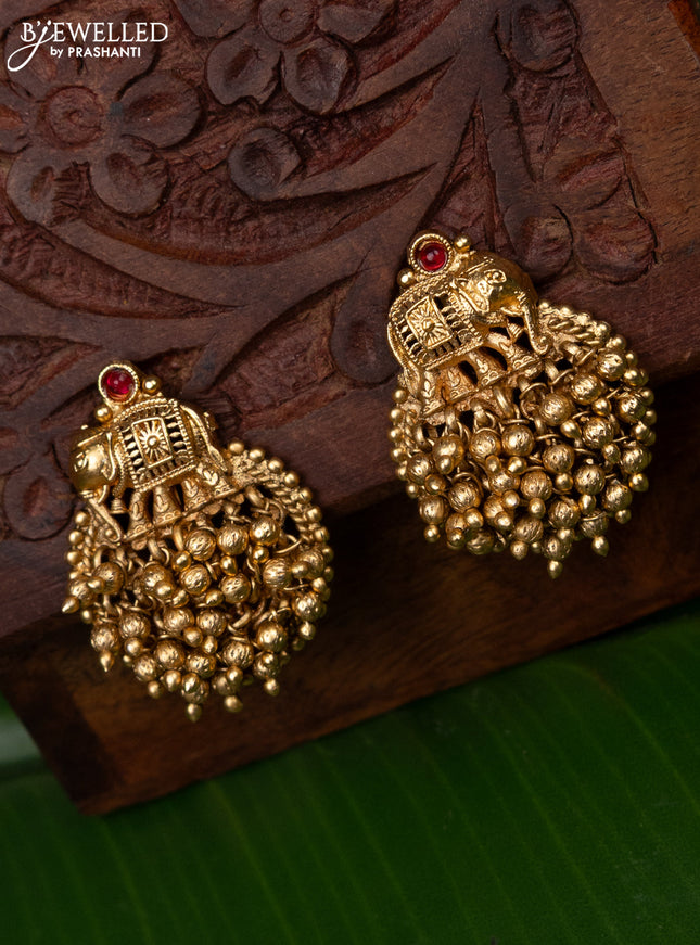 Antique earring elephant design with pink kemp stone and golden beads hanging