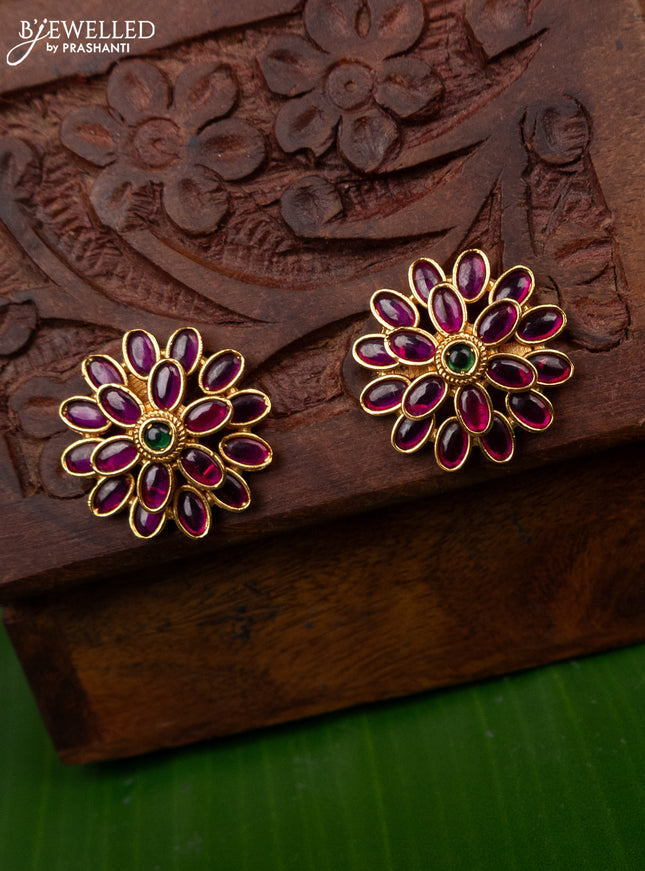 Antique screw type earring floral design with kemp stones
