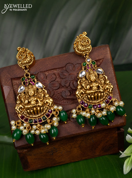 Antique earring lakshmi & peacock design with kemp & kundan stones and pearl & green beads hanging