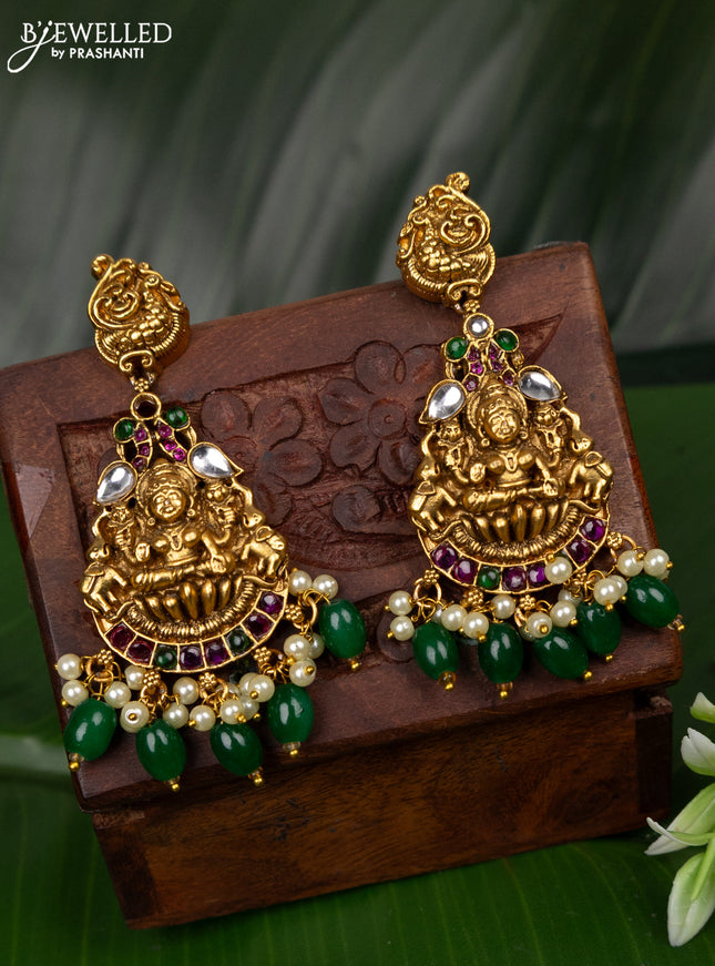 Antique earring lakshmi & peacock design with kemp & kundan stones and pearl & green beads hanging