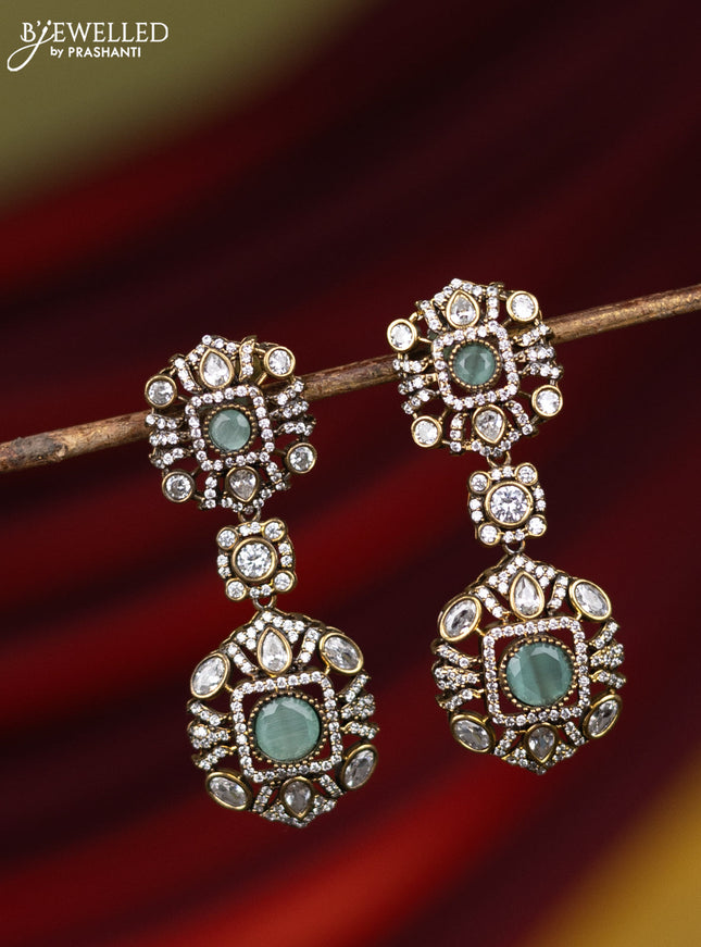 Earring with mint green and cz stones in victorian finish