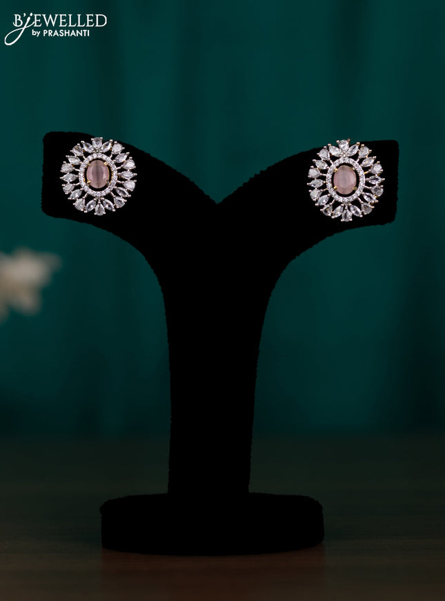 Zircon earring with baby pink and cz stones in gold finish