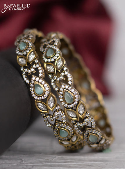 Victorian finish bangle with mint green & kundan and cz stones