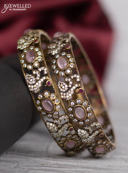 Victorian finish bangle swan design with baby pink and cz stones