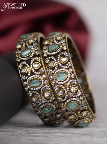 Victorian finish bangle with mint green & kundan and cz stones
