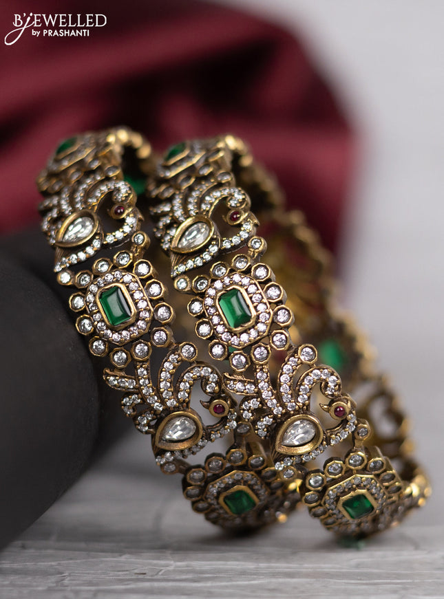 Victorian finish bangle peacock design with emerald & kundan and cz stones