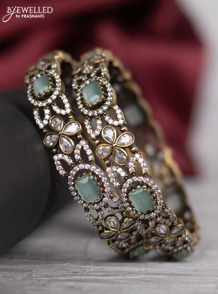 Victorian finish bangle floral design with mint green & kundan and cz stones