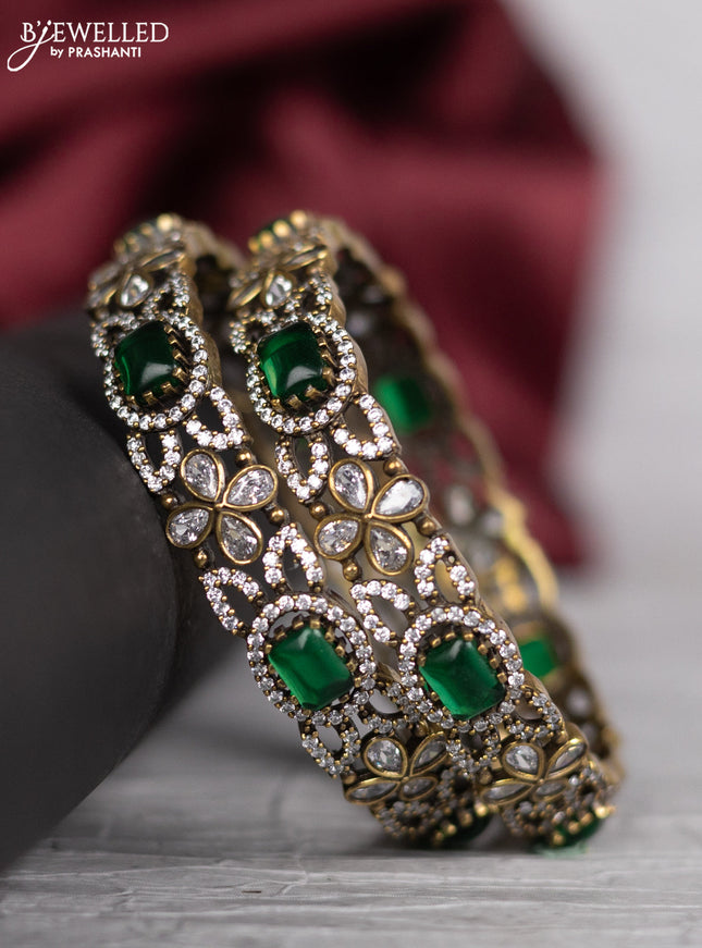 Victorian finish bangle floral design with emerald and cz stones