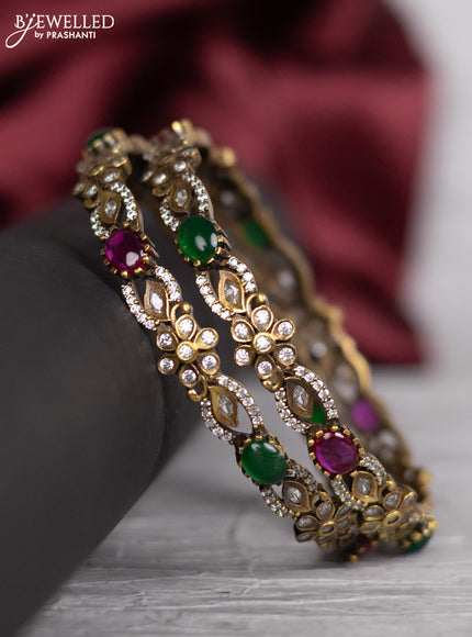 Victorian finish bangle floral design with kemp and cz stones