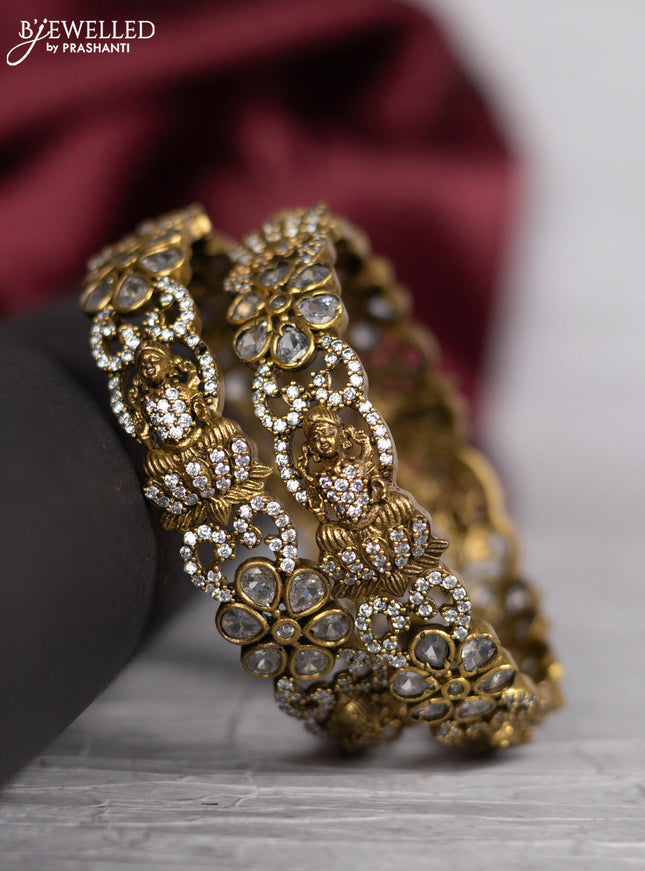 Victorian finish bangle lakshmi design with cz stones