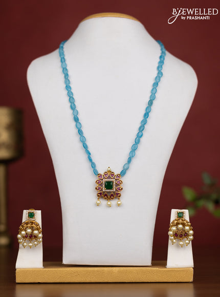 Beaded light blue Necklace with ruby and cz stones and pearl hangings