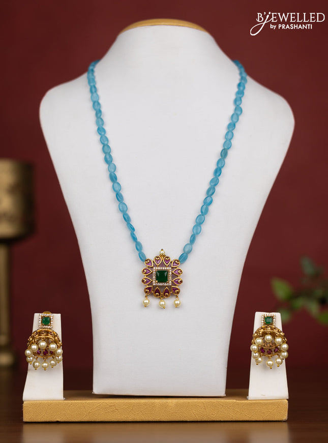 Beaded light blue Necklace with ruby and cz stones and pearl hangings