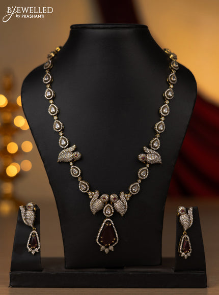 Necklace with parrot design baby pink and cz stones