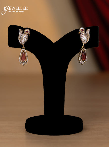 Necklace with parrot design baby pink and cz stones