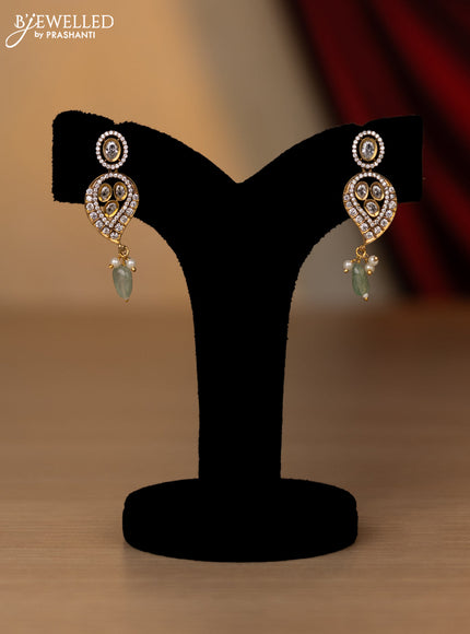 Necklace with leaf design white and cz stones