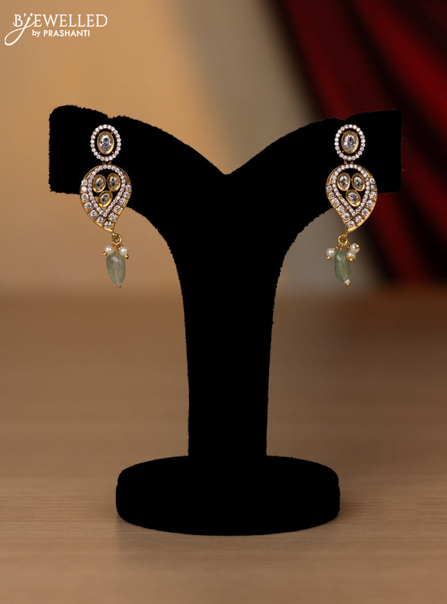 Necklace with leaf design white and cz stones