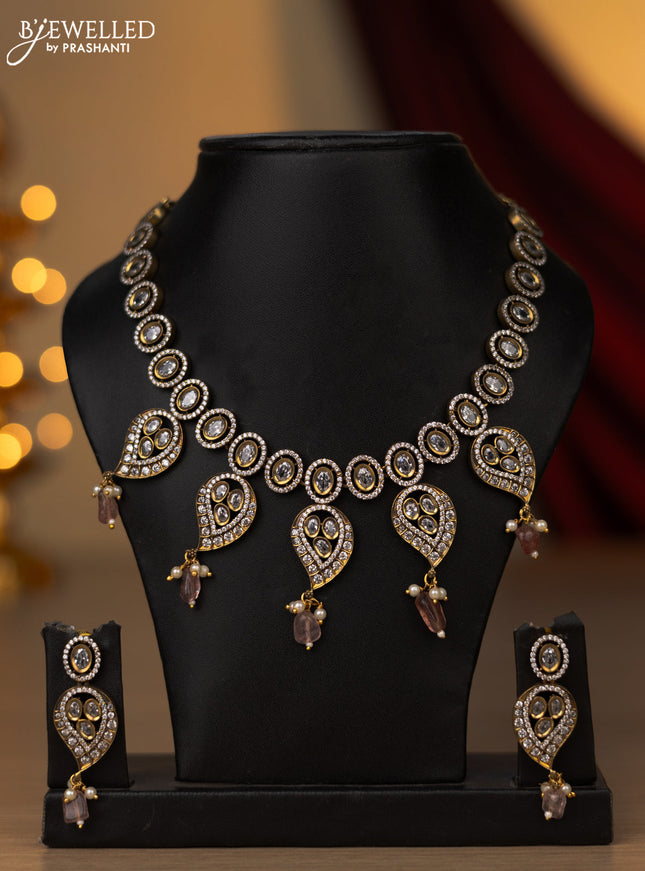 Necklace with leaf design baby pink and cz stones