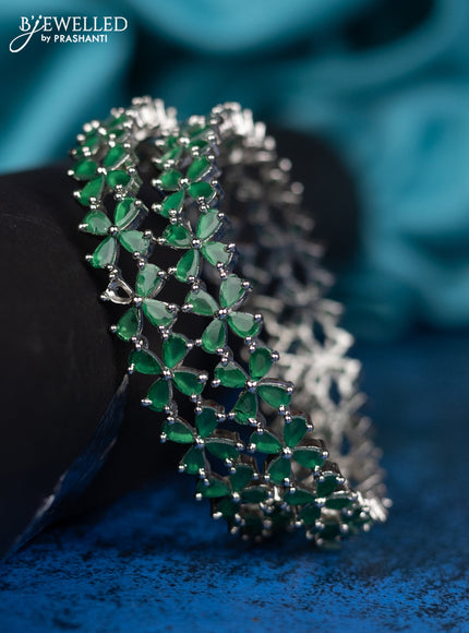Zircon Bangle floral design with green cz stone