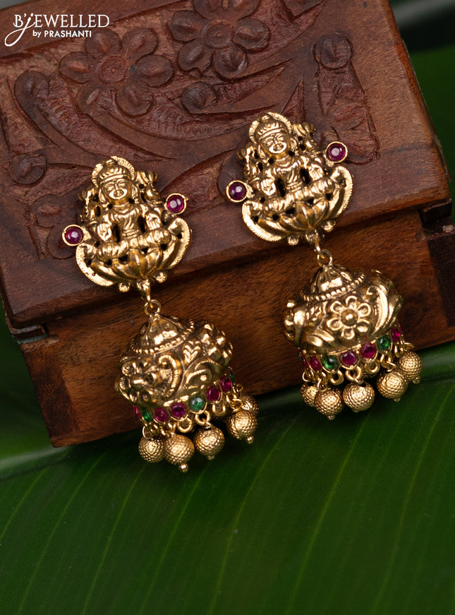 Antique jhumka lakshmi design with kemp stones and golden beads hanging