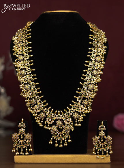 Antique guttapusalu haaram floral design with green kemp & cz stones and pearl hangings
