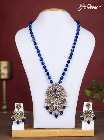 Beaded blue necklace peacock design with sapphire & cz stones and pearl & beads hanging in victorian finish