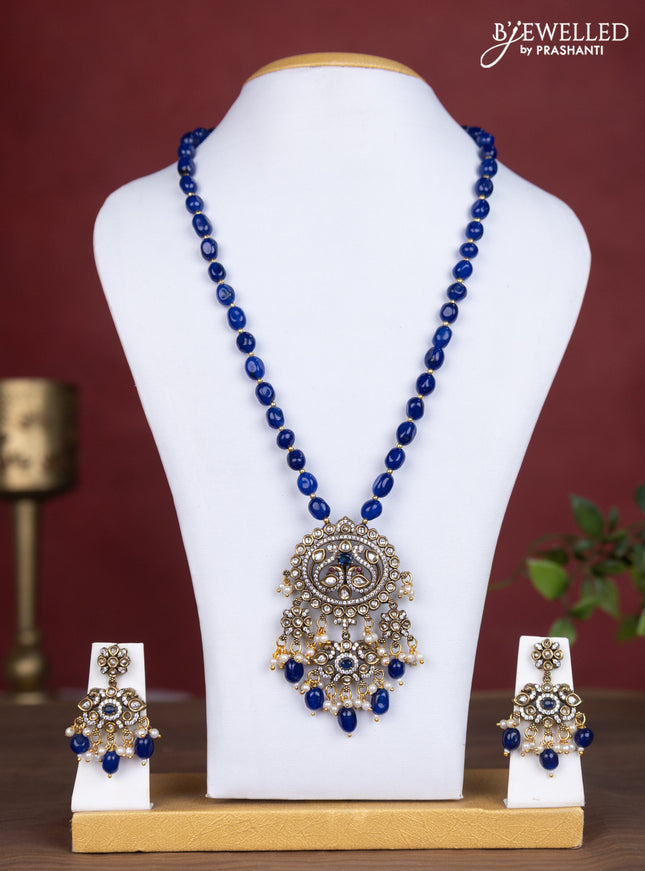 Beaded blue necklace peacock design with sapphire & cz stones and pearl & beads hanging in victorian finish