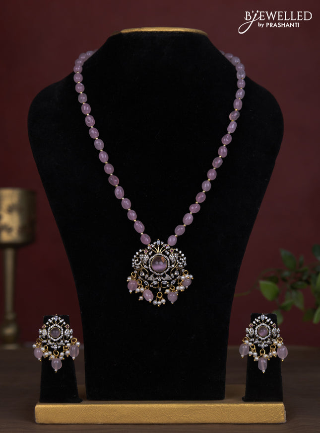 Beaded baby pink necklace with cz stones and pearl & beads hanging in victorian finish