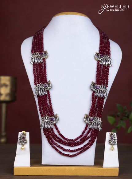 Beaded multilayer necklace with peacock side pendant in victorian finish
