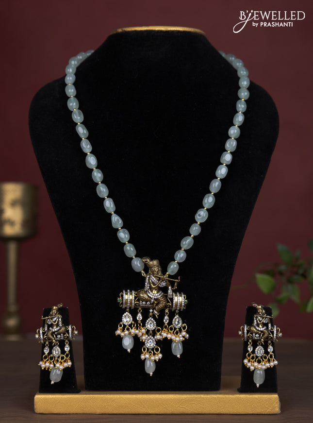 Beaded mint green necklace krishna pendant with kemp & cz stones and pearl & beads hanging in victorian finish