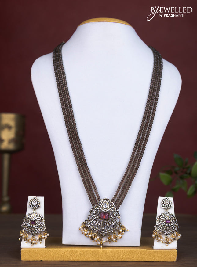 Beaded triple layer brown necklace with ruby & cz stones and pearl hangings in victorian finish