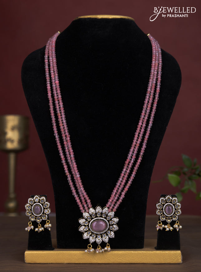 Beaded triple layer baby pink necklace with cz stones and pearl hangings in victorian finish