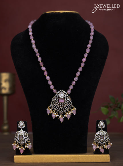 Beaded baby pink necklace with cz stones and pearl & beads hanging in victorian finish