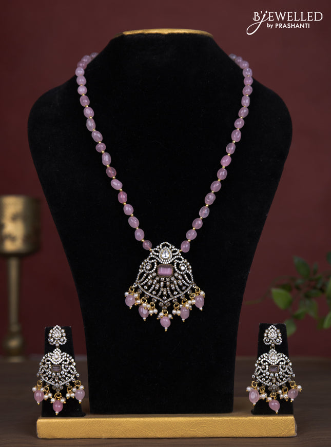 Beaded baby pink necklace with cz stones and pearl & beads hanging in victorian finish
