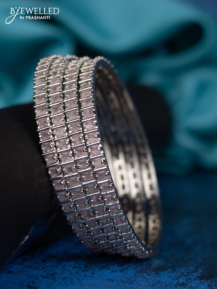 Zircon bangle with pink stones