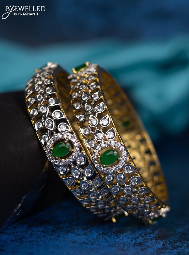 Zircon bangle with green and cz stones in gold finish