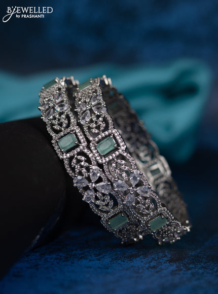 Zircon bangle with mint green and cz stones