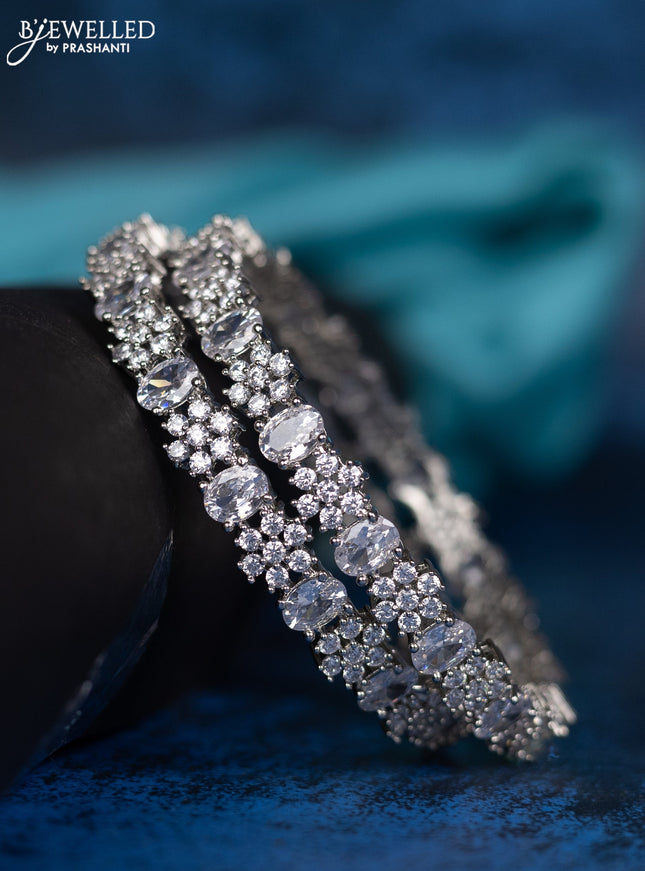 Zircon bangle with cz stone in white finish