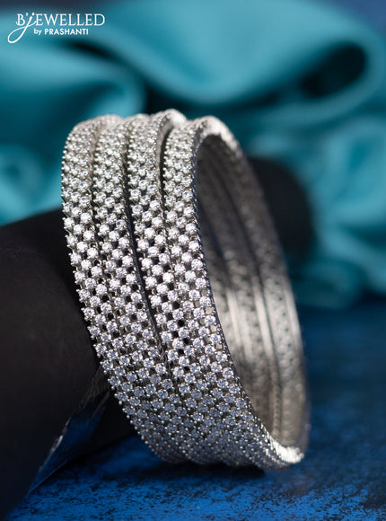 Zircon bangle with cz stones