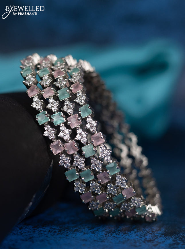 Zircon bangle with mnit green and baby pink stones