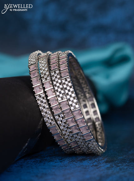 Zircon bangle with baby pink stones