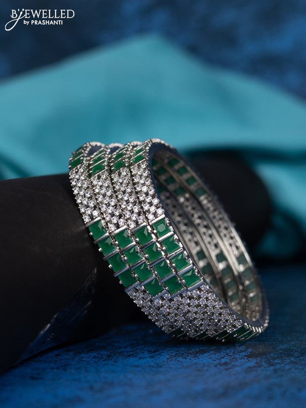Zircon bangle with emerald and cz stones