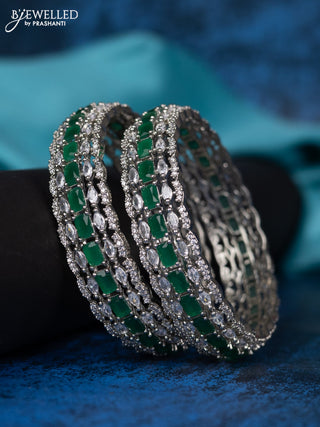 Zircon bangle with emerald and cz stones
