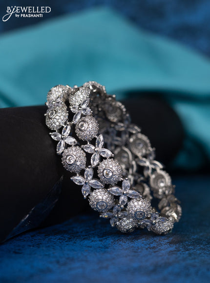 Zircon bangle floral design with cz stones